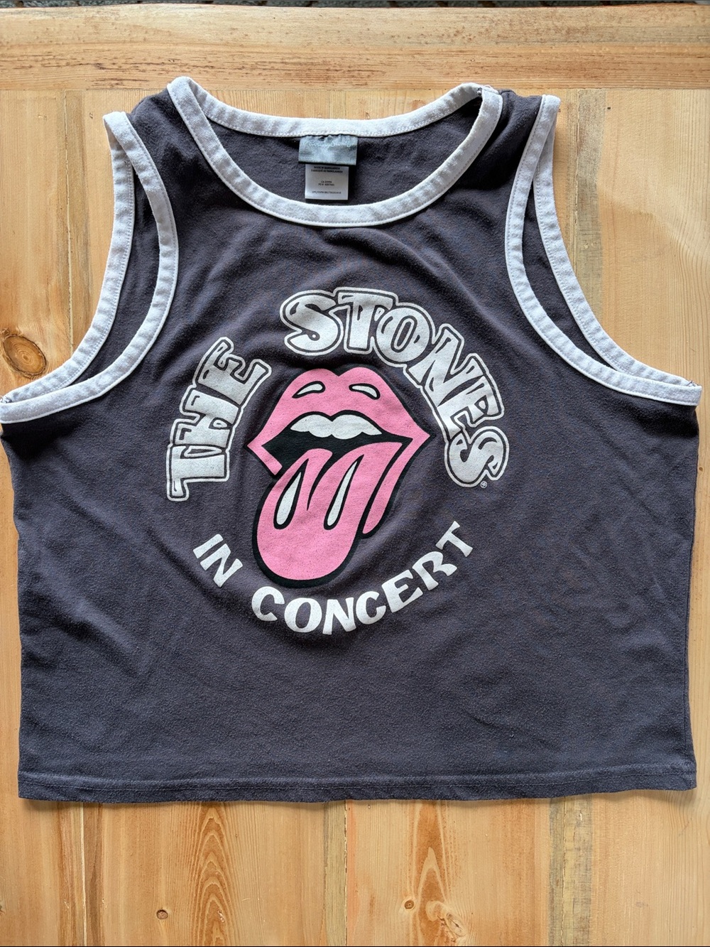 the Rolling Stones Black Tank Top with Pink Tongue Graphic
